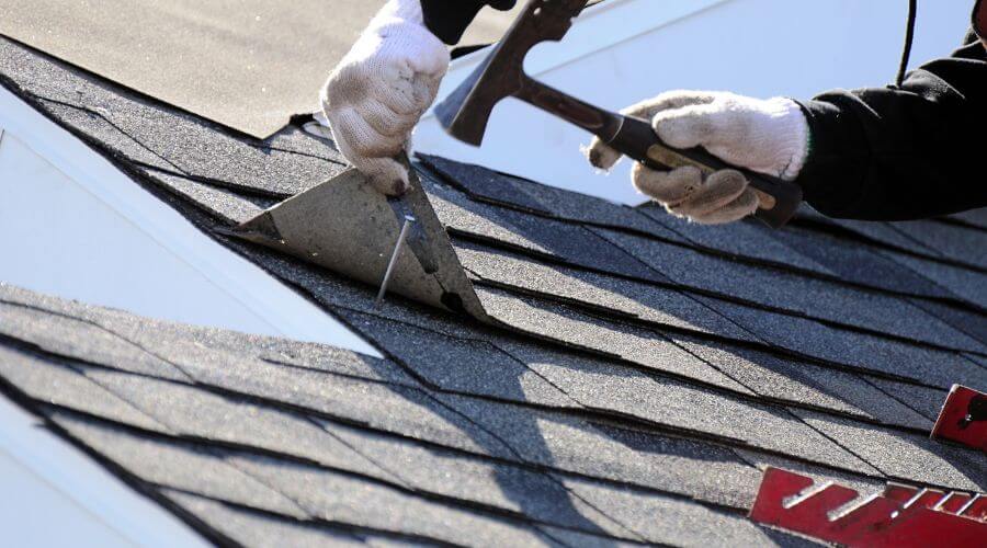Expert tile roof repair services in Raymond, IL